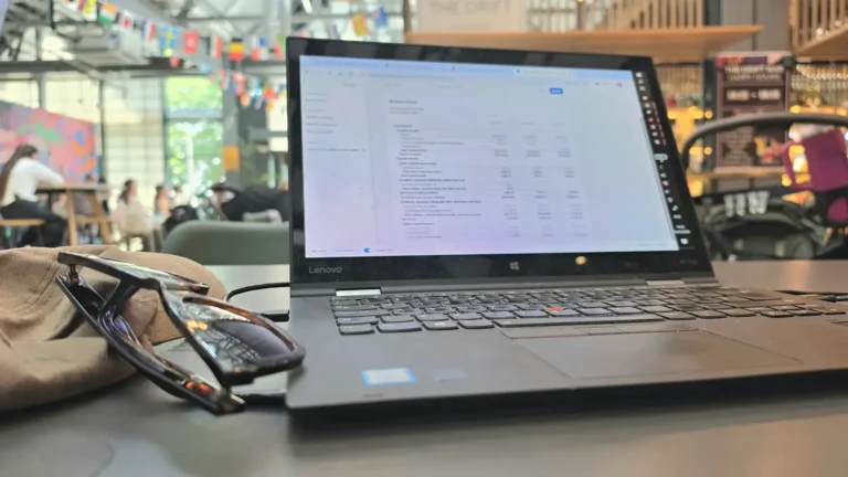 Laptop showing Xero balance sheet in a café - reviewing BTL company carried forward losses